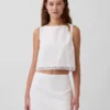 Crop-top van linnenmix met kanten zoom
