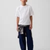 Kinderjeans met losse pasvorm en taps toelopende pijpen
