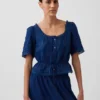Top met peplum en kanten rand