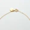 Admiral Row gouden halve maan ketting