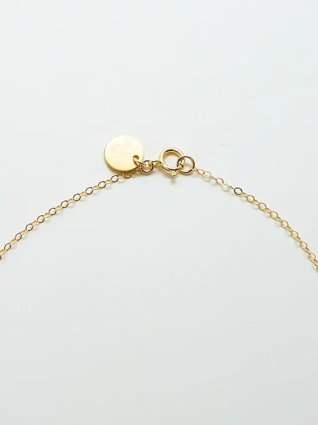Admiral Row gouden halve maan ketting