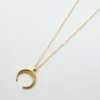 Admiral Row gouden halve maan ketting
