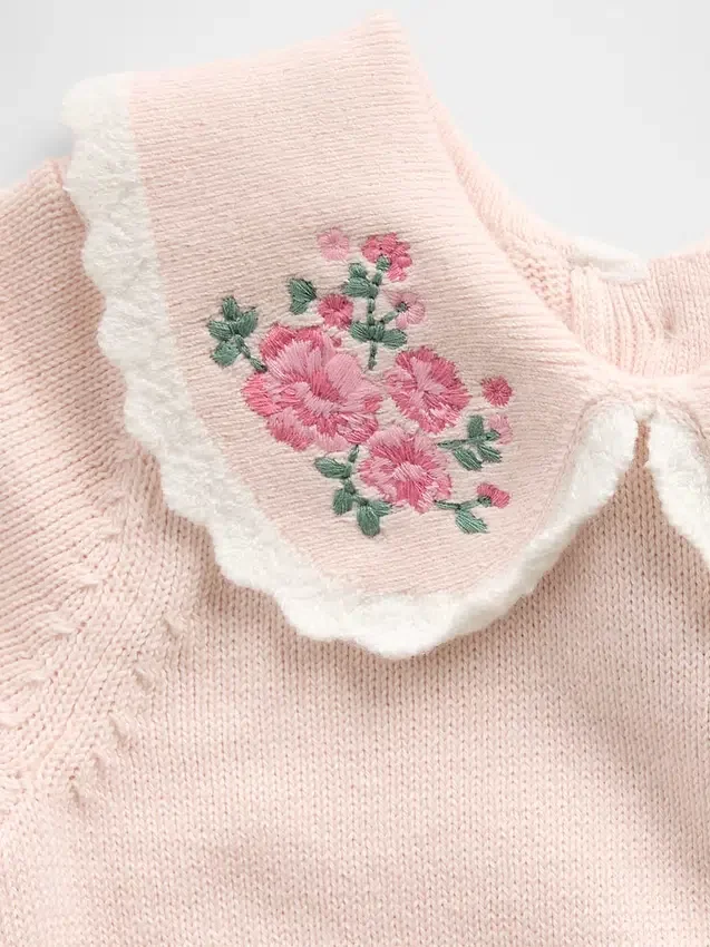 Baby-body met geborduurde kraag