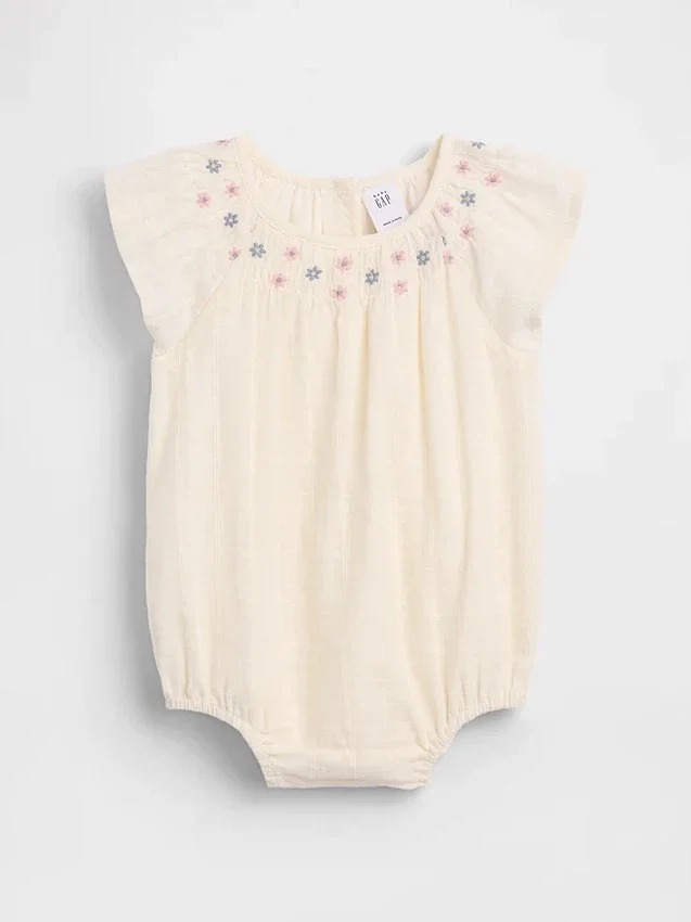 Baby-body met gesmokt bloemenpatroon
