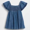 Baby-denimjurk met smockwerk