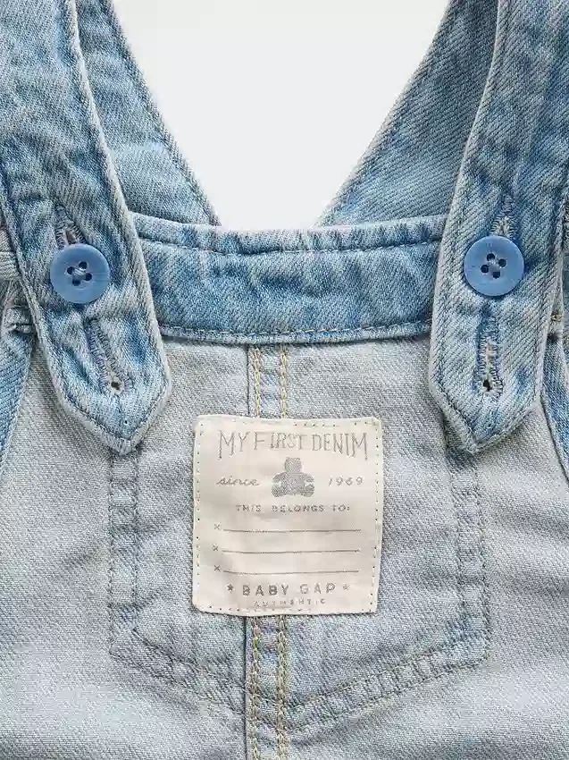 Baby-overall van denim met geborduurde bloemen