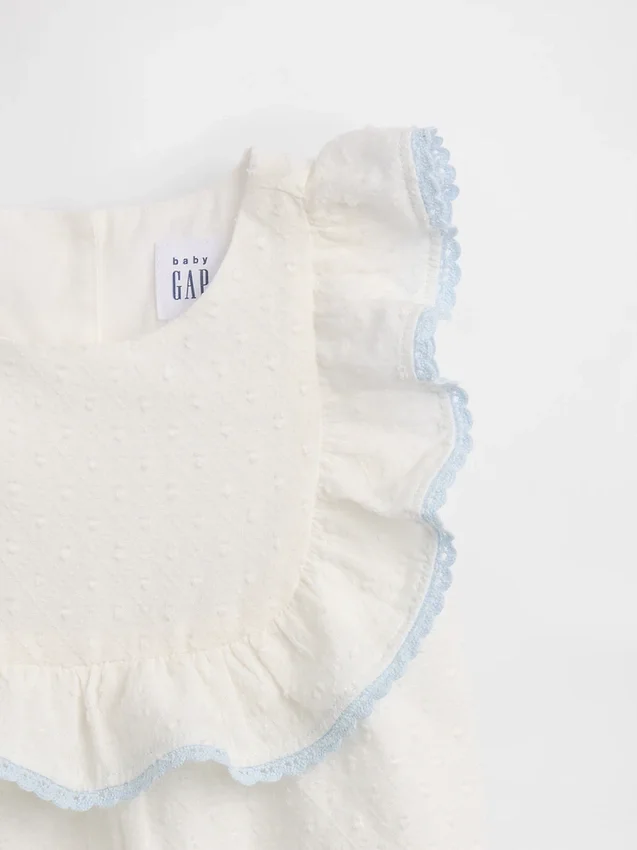 Baby-set met slabbetje met gaatjes