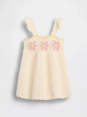 Babyjurk met gehaakte bloemen