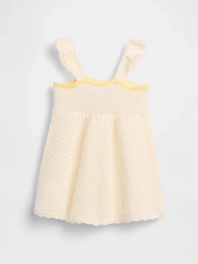 Babyjurk met gehaakte bloemen