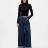 Baggy-Jeans met middelhoge taille en metallic omgeslagen boorden