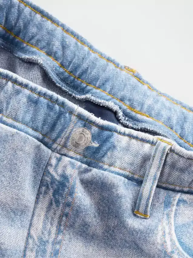 Baggy joggingbroek met print in Jeanslook