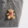 Brannan Bear sjaal tasbedeltje