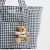 Brannan Bear T-shirt-tasbedeltje