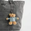 Brannan Bear-tasbedeltje in denimjasstijl
