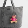 Brannan Bear-tasbedeltje in hoodie-stijl
