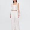 Broek met middelhoge taille, oogjes en wijde pijpen
