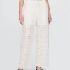 Broek met middelhoge taille, oogjes en wijde pijpen