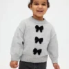 CashSoft-trui met strik voor Baby & Peuter