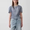 Crop-top met peplum en knoopsluiting aan de voorkant
