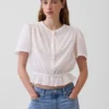 Crop-top met peplum en knoopsluiting aan de voorkant