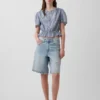 Crop-top met peplum en knoopsluiting aan de voorkant
