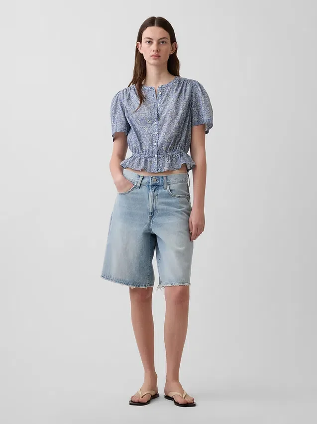 Crop-top met peplum en knoopsluiting aan de voorkant
