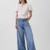 Crop-top met peplum en knoopsluiting aan de voorkant