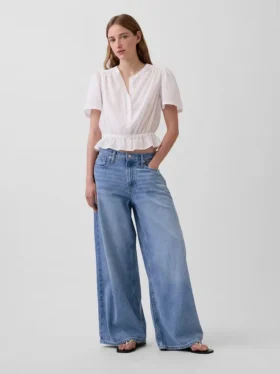 Crop-top met peplum en knoopsluiting aan de voorkant