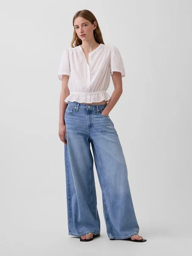 Crop-top met peplum en knoopsluiting aan de voorkant