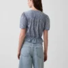 Crop-top met peplum en knoopsluiting aan de voorkant
