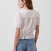Crop-top met peplum en knoopsluiting aan de voorkant