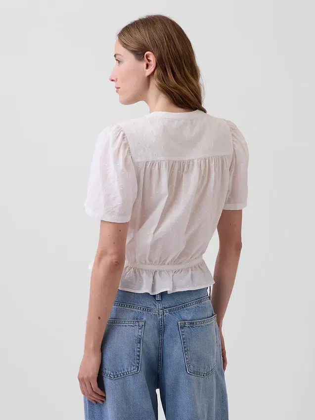 Crop-top met peplum en knoopsluiting aan de voorkant