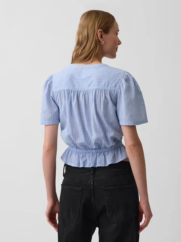 Crop-top met peplum en knoopsluiting aan de voorkant