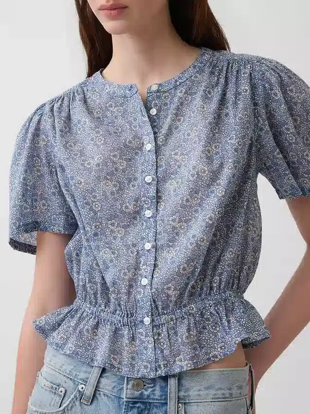 Crop-top met peplum en knoopsluiting aan de voorkant