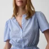 Crop-top met peplum en knoopsluiting aan de voorkant