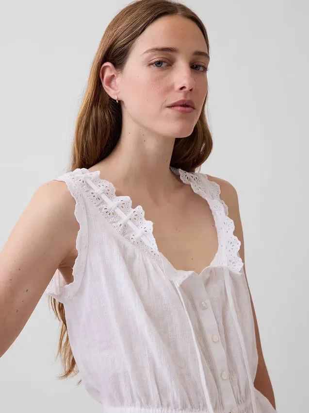 Crop-top met peplum en strik aan de voorkant
