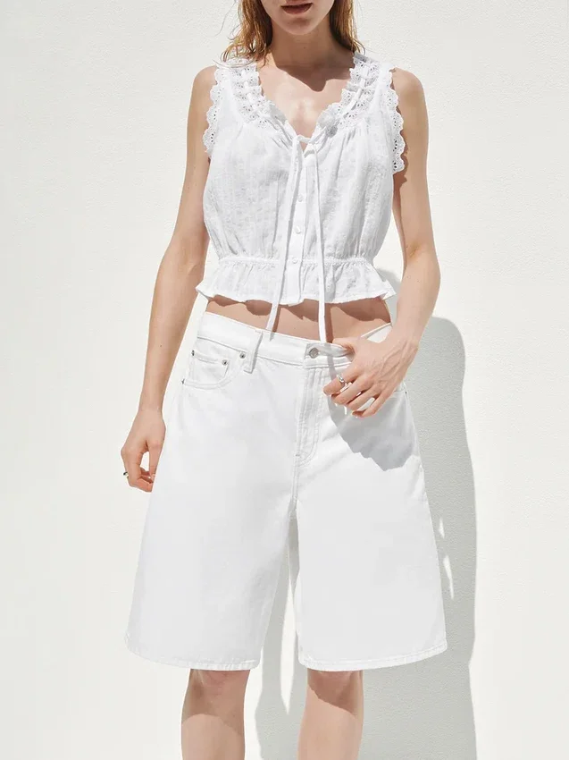 Crop-top met peplum en strik aan de voorkant