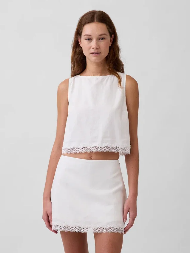 Crop-top van linnenmix met kanten zoom