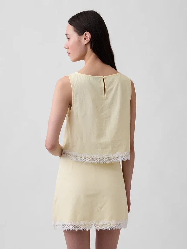 Crop-top van linnenmix met kanten zoom