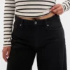 Curvy mid-rise ultrazachte baggy Jeans
