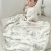 De Gilded Bird Safari Toile bamboe babydeken