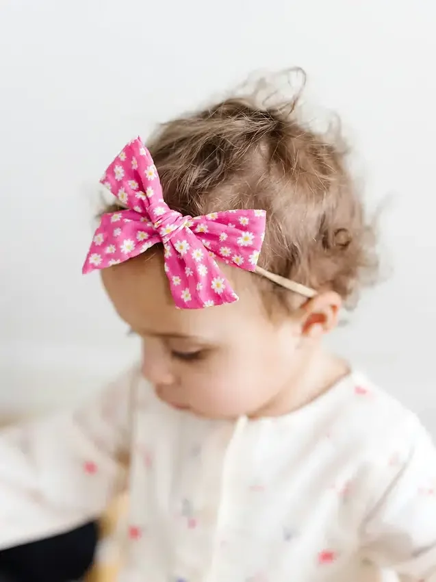 De Nora-hoofdbanden met strik-bundel