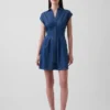 Denim mini-shirtjurk met plooien