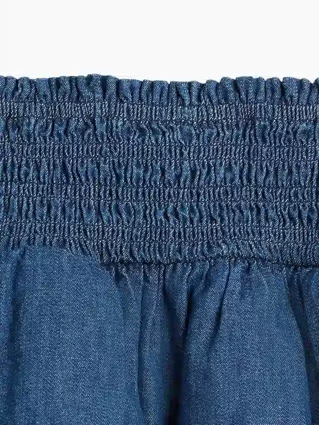 Denim miniskort met smockwerk voor kinderen