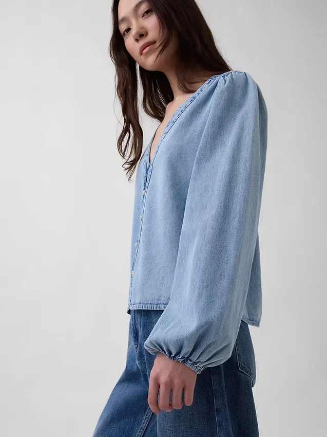 Denim top met pofmouwen