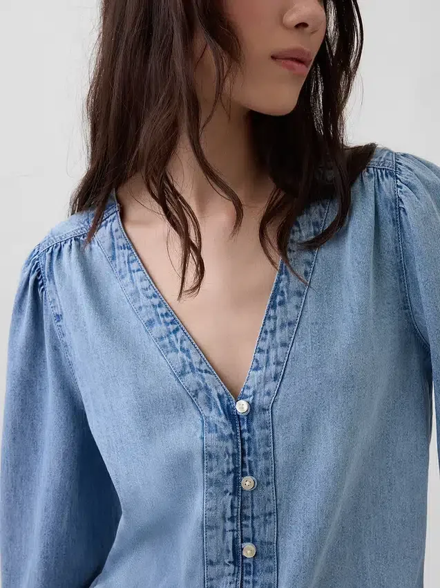 Denim top met pofmouwen
