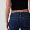 Extra lage taille, lange en slanke Jeans