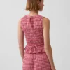 Gesmokte peplumtop met ginghamprint