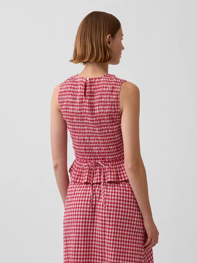 Gesmokte peplumtop met ginghamprint