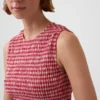 Gesmokte peplumtop met ginghamprint